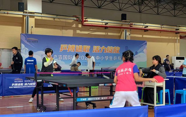 西安市浐灞第二中学参加西安浐灞国际港2024年中小学乒乓球比赛(图5)